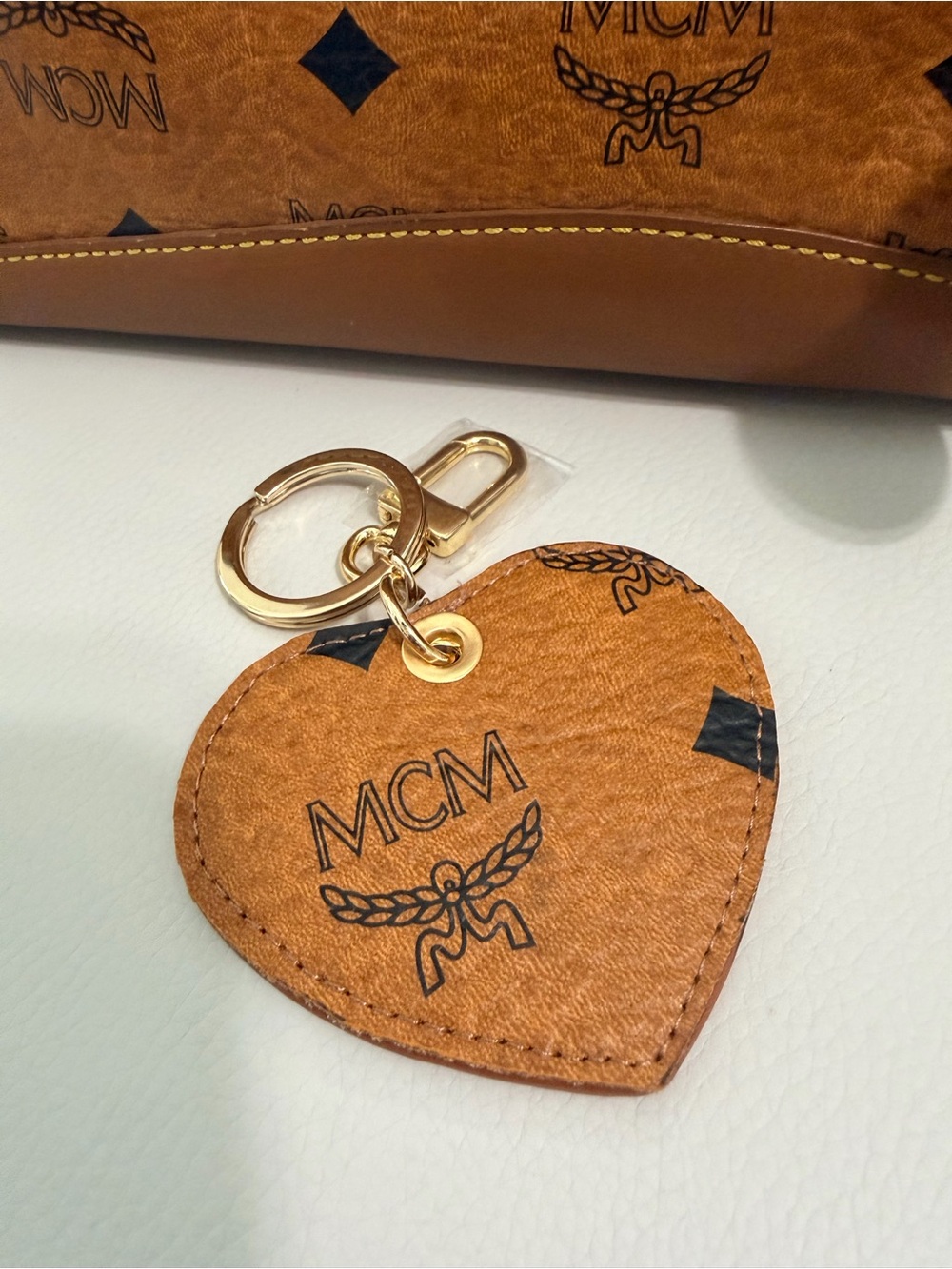 MCM upcycled Cognac Heart bag charm with COA